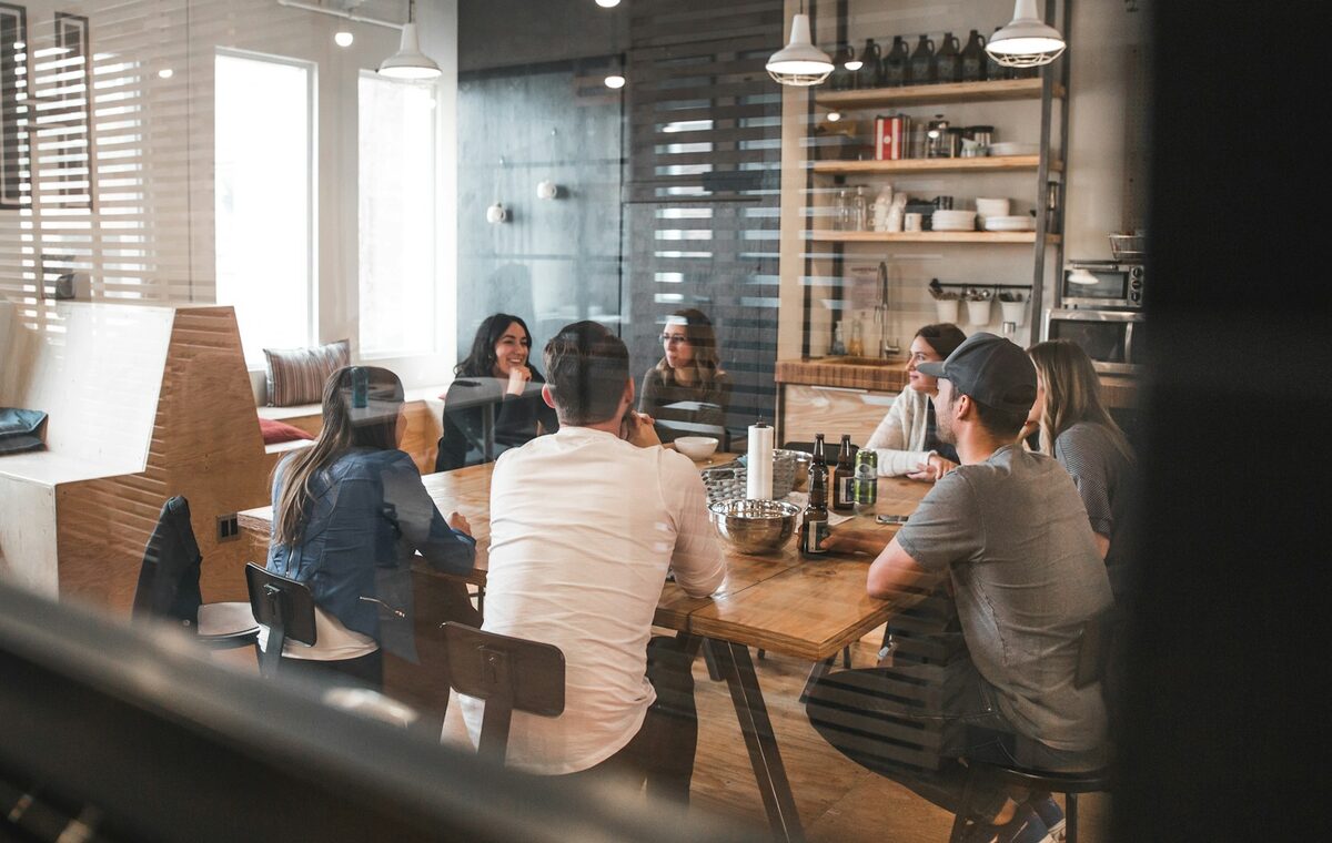 Professional team working together around a meeting table